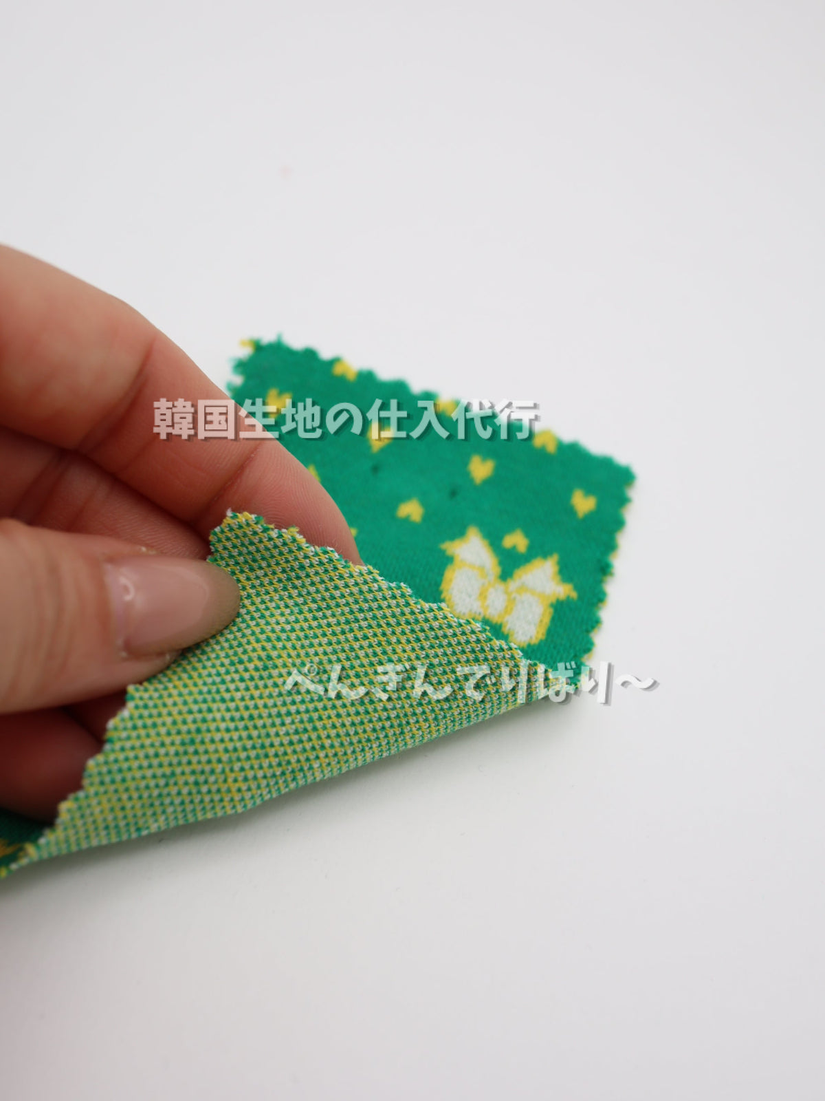 リボン×プチハート・二重織りジャガードニット生地|【生地幅】約132cm 【混率】綿80%・ポリエステル15%・ポリウレタン5%|ドッグウェア・ベビーアパレル向け 26SS-054