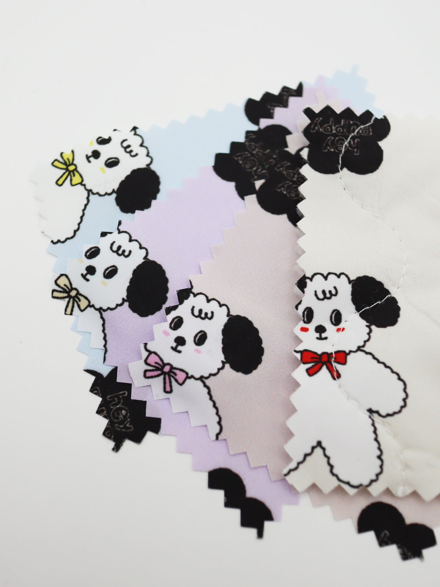 【25SS-089】よそ見ワンちゃんプリントキルティングタフタ /0.5yあたり = ~ 1105円