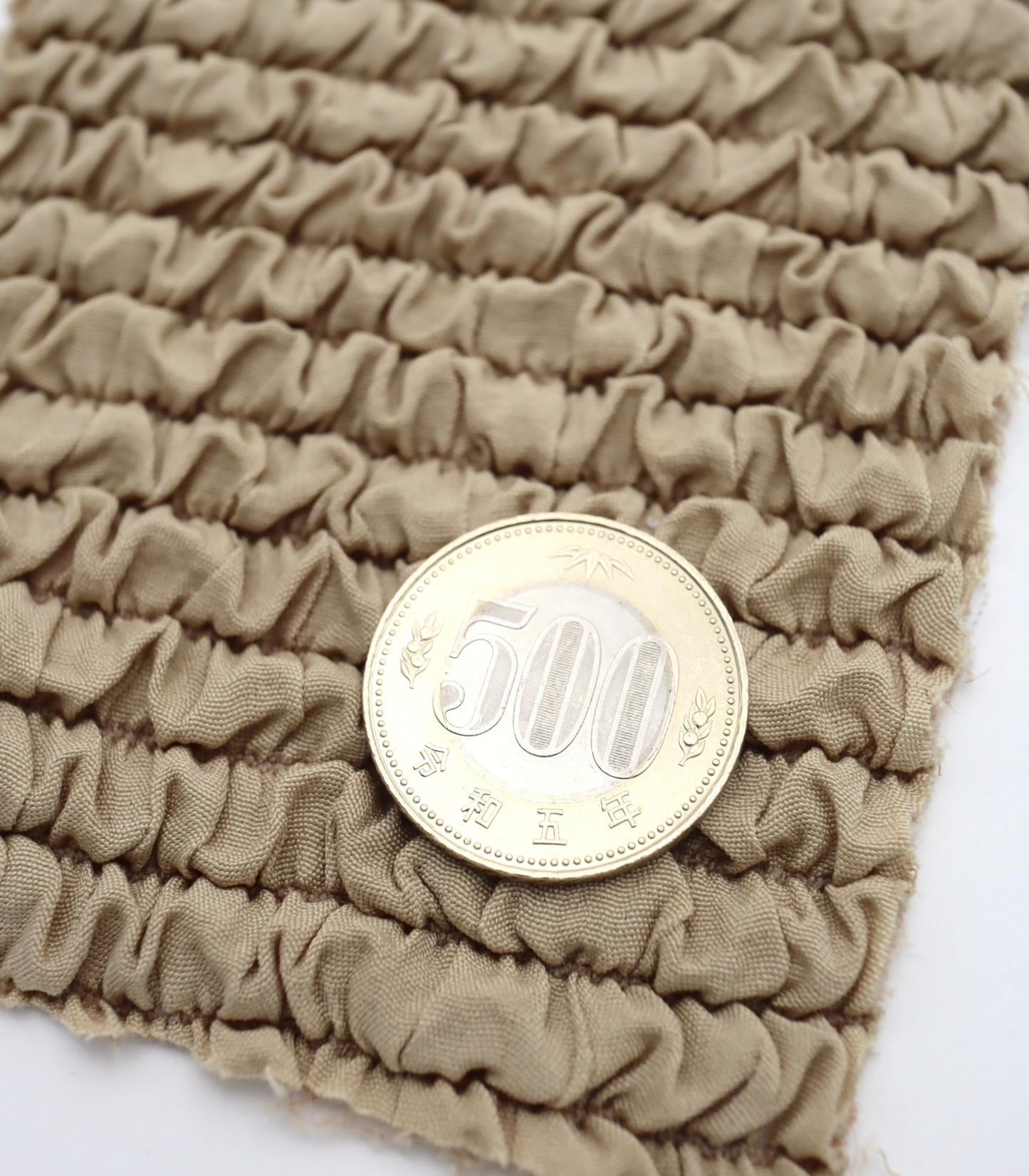【25SS-212】くしゅくしゅゴムシャーリング風二重接結ニット /0.5yあたり = ~875円