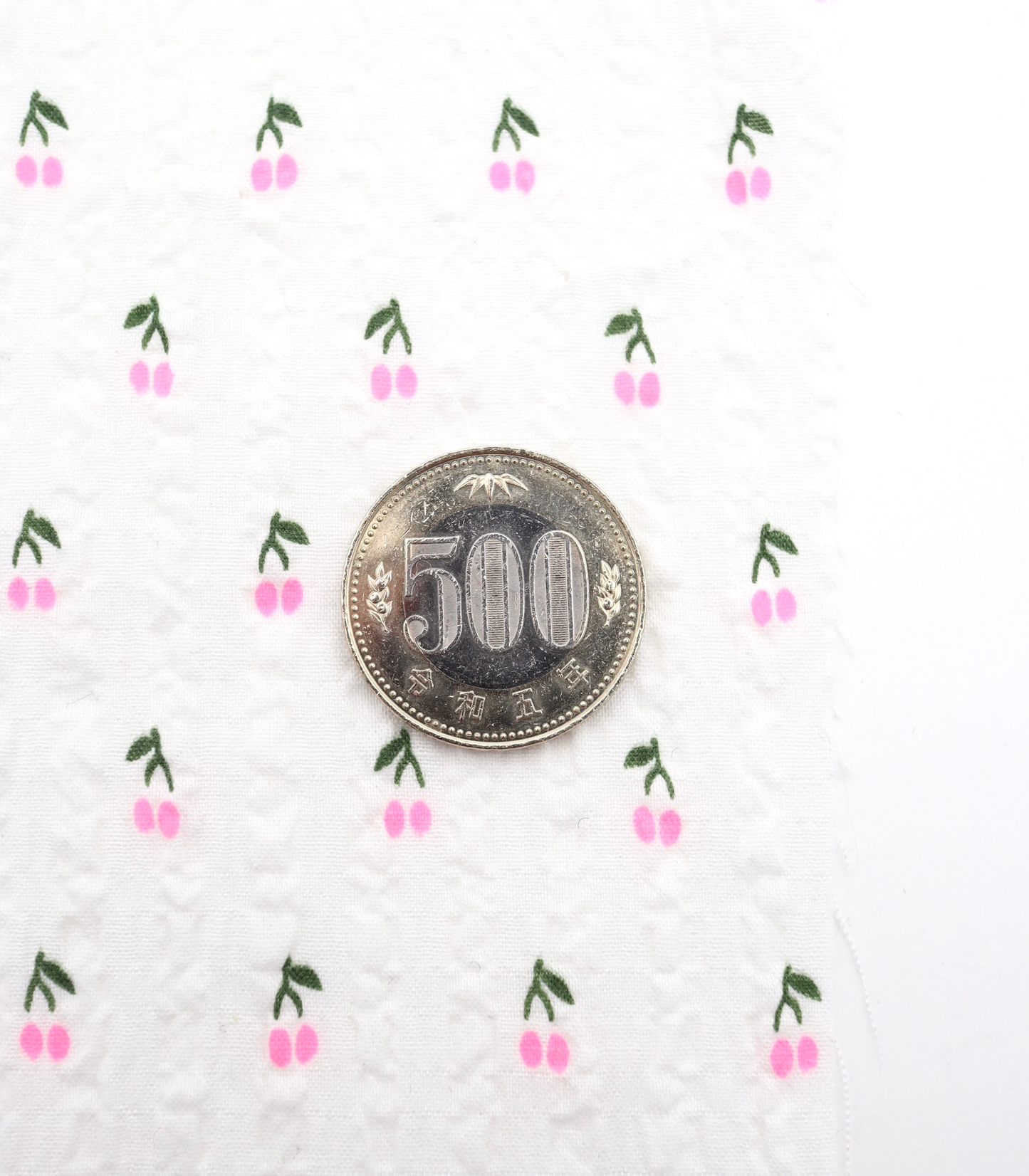 【25SS-435】蛍光チェリープリントサッカー /0.5yあたり=~ 630円