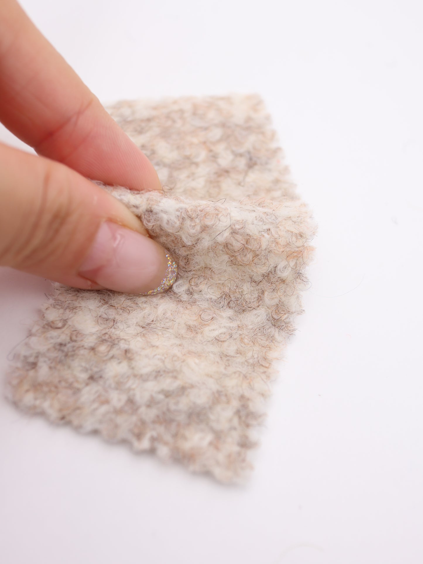 【25AW-010】ウール混くるくる圧縮ブークレニット /0.5yあたり=~1615円