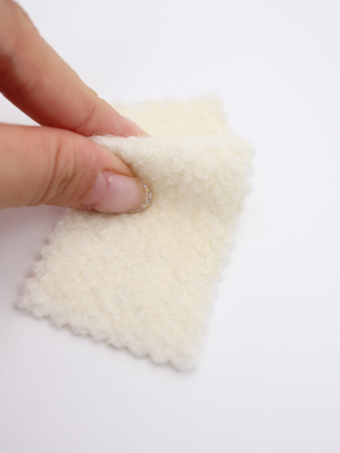 【25AW-010】ウール混くるくる圧縮ブークレニット /0.5yあたり=~1615円