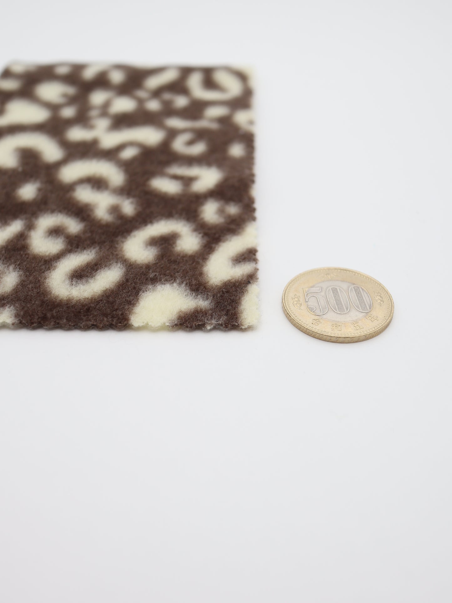 【25AW-028】リバーシブルヒョウ柄プリント両面起毛ニット /0.5yあたり=~880円