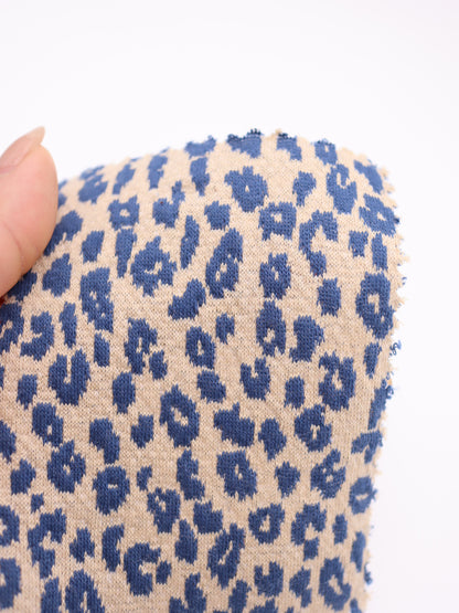ヒョウ柄ふくれジャガードニット生地｜ぽこぽこ立体意匠｜ドッグウェア（犬服）・キッズ服向け｜26SS-155【生地仕入れ代行卸】