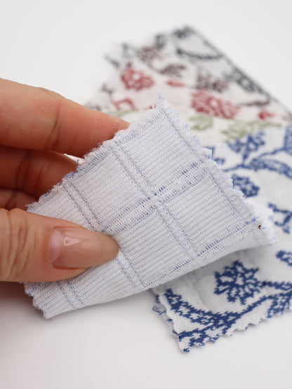 透け感のない肉厚な花柄刺繍生地、裏地なしアウターの量産に