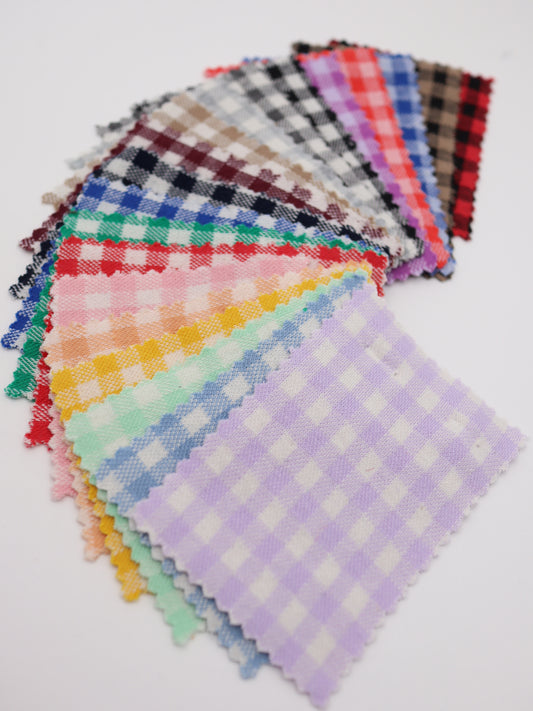 ギンガムチェック柄の綿混ジャガード生地、全20色のカラーバリエーション一覧