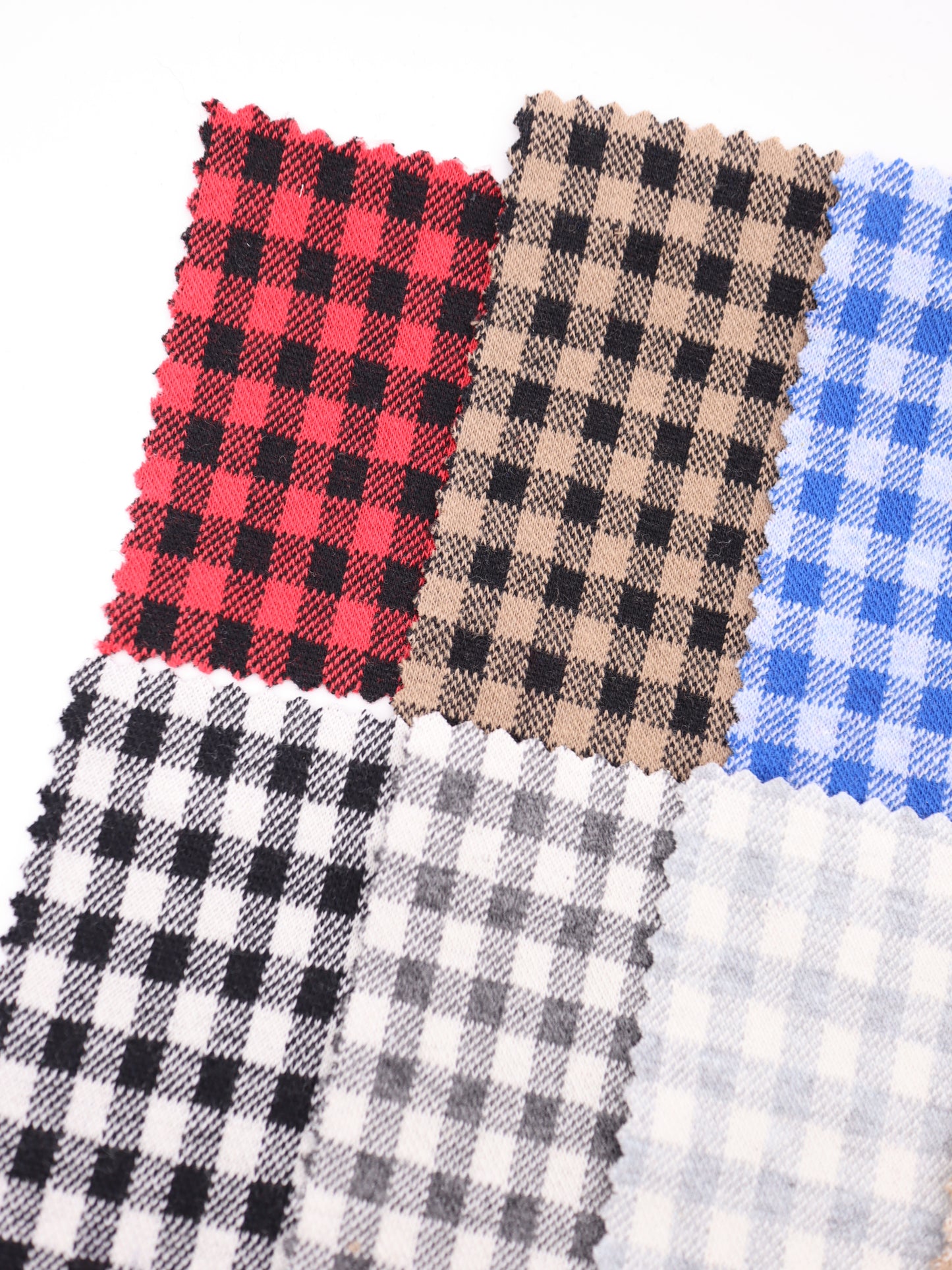 20色の豊富な色彩が並ぶ、ギンガムチェック柄ジャガードのカラーパレット