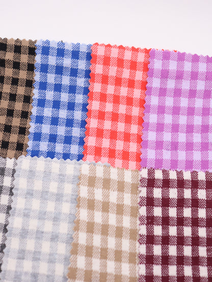 20色の豊富な色彩が並ぶ、ギンガムチェック柄ジャガードのカラーパレット