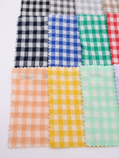 20色の豊富な色彩が並ぶ、ギンガムチェック柄ジャガードのカラーパレット