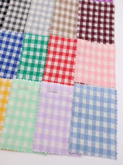 20色の豊富な色彩が並ぶ、ギンガムチェック柄ジャガードのカラーパレット
