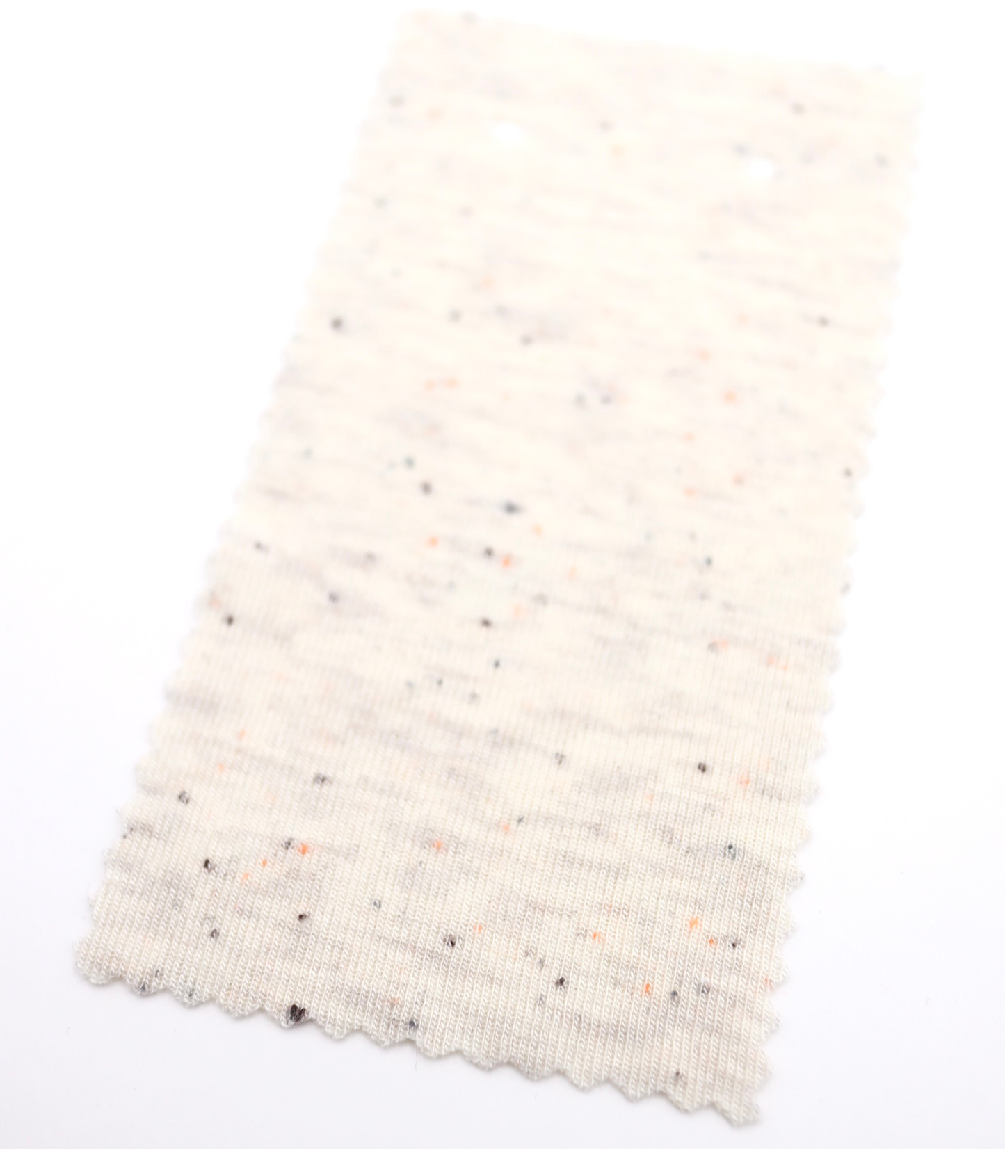 韓国生地カラフル糸入りつぶつぶフライス　オレンジ粒　オフ拡大