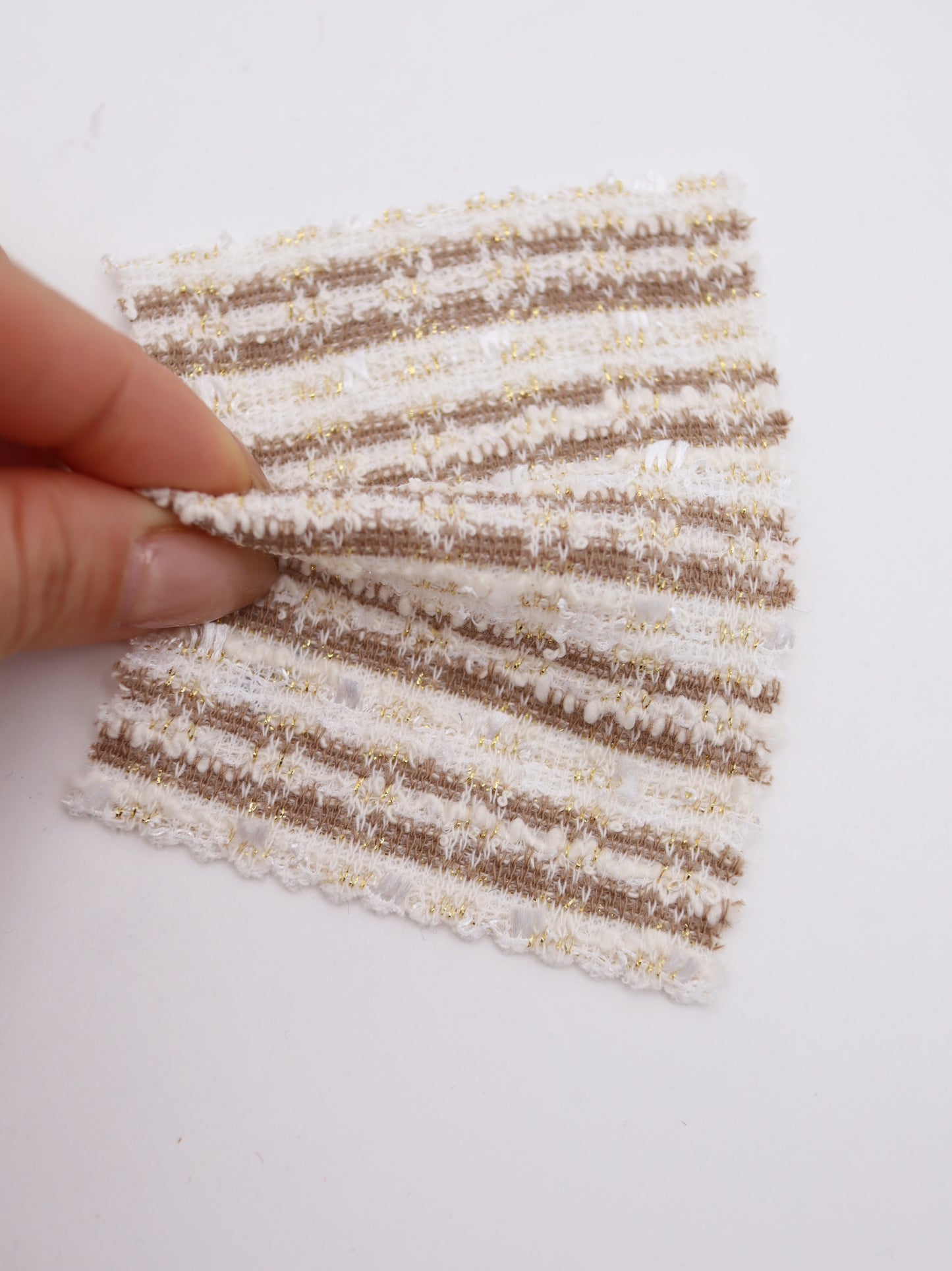 ストレッチ性あるツイード見えラメ糸入りニット生地【26SS-071】