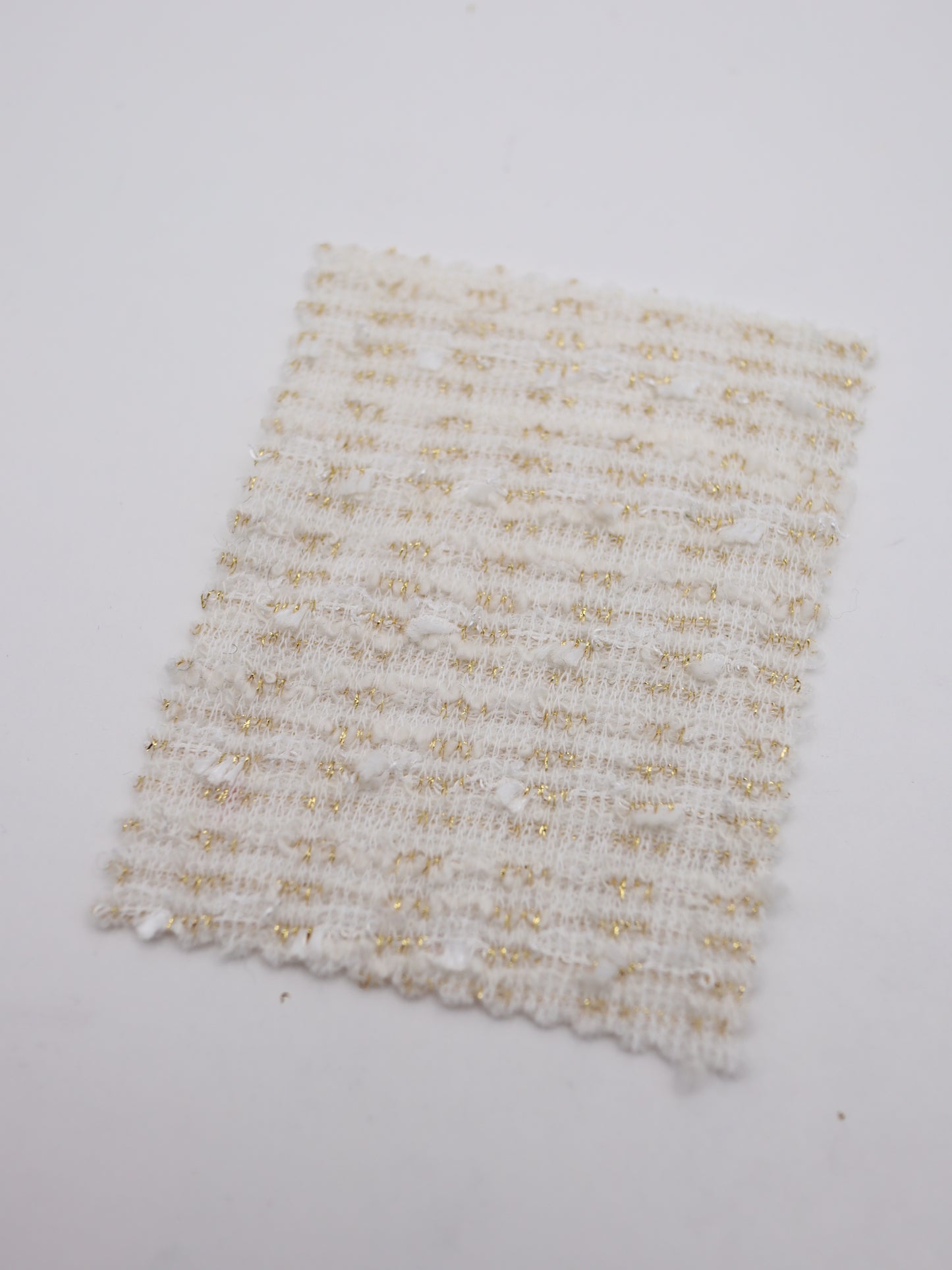 ストレッチ性あるツイード見えラメ糸入りニット生地【26SS-071】