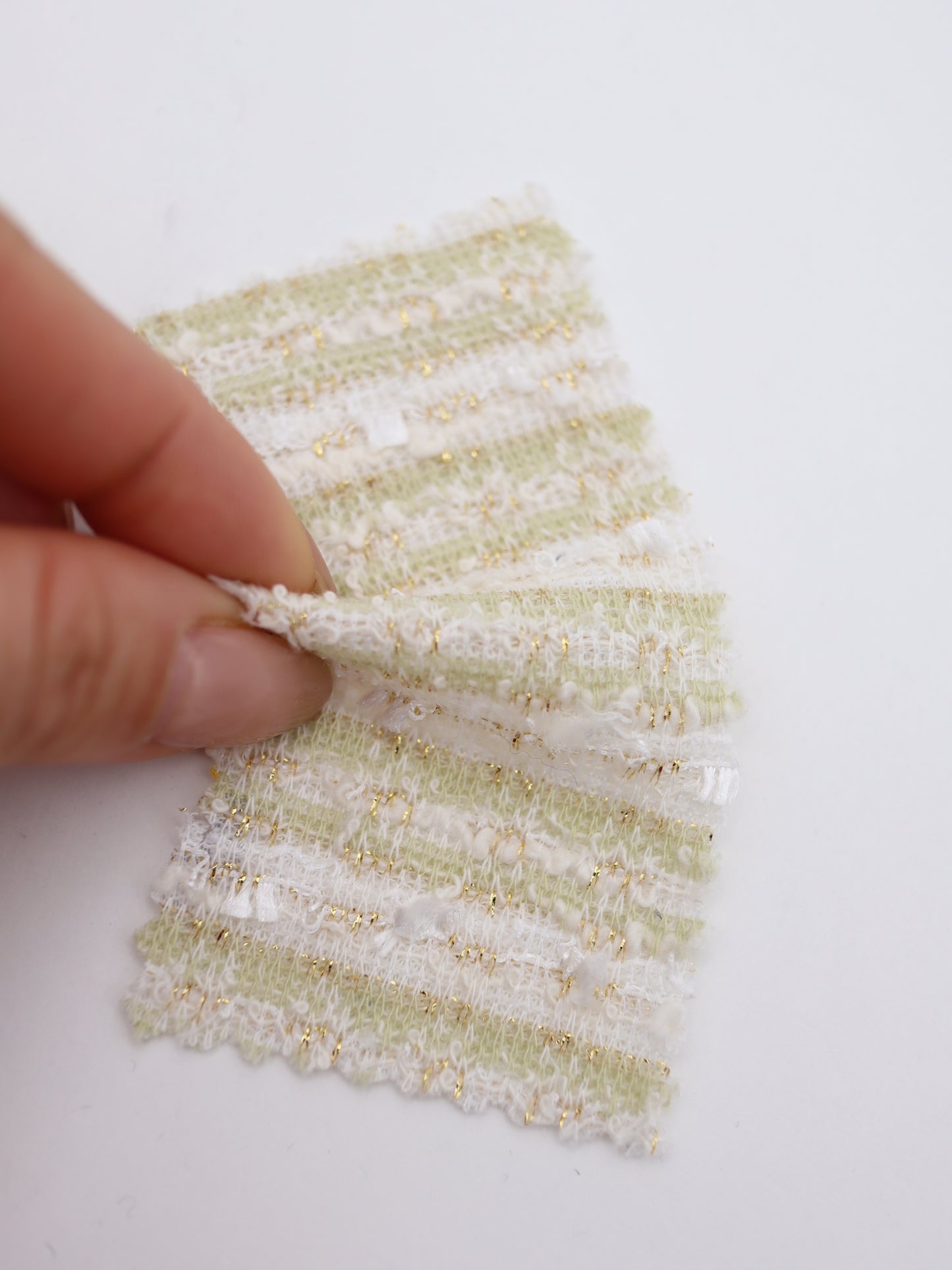 ストレッチ性あるツイード見えラメ糸入りニット生地【26SS-071】