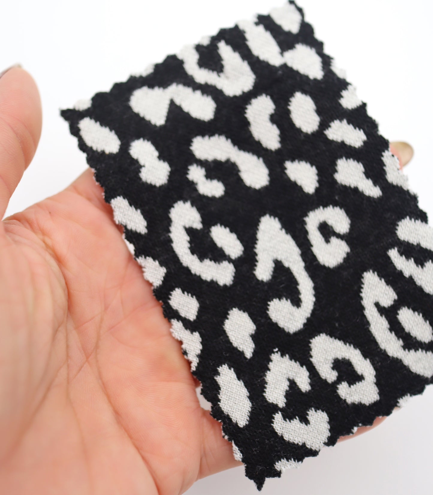 【25SS-359】ヒョウ柄ジャガード二重織りニット　/0.5ｙあたり = ～ 880円