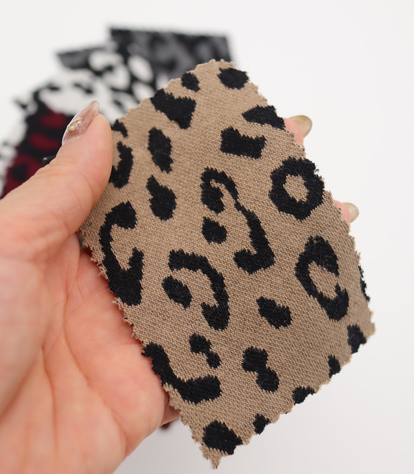 【25SS-359】ヒョウ柄ジャガード二重織りニット　/0.5ｙあたり = ～ 880円