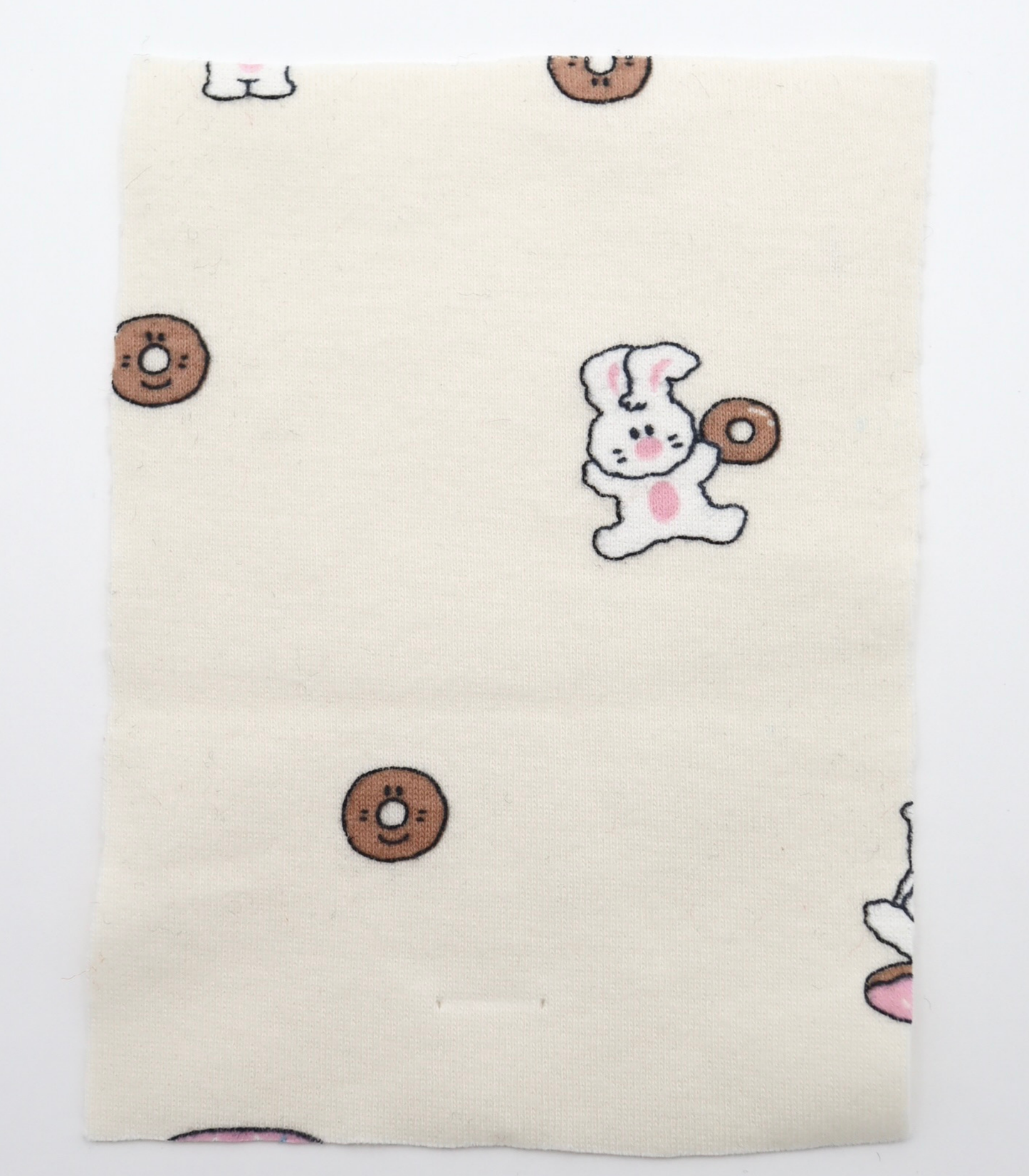 【25SS-202】ドーナッツラバーうさちゃんプリントフライス　/0.5ｙあたり = ～ 900円