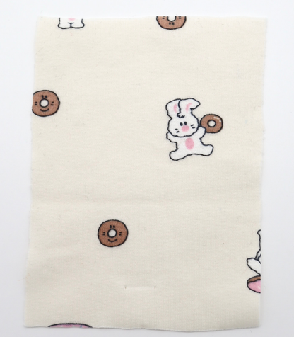 【25SS-202】ドーナッツラバーうさちゃんプリントフライス　/0.5ｙあたり = ～ 900円