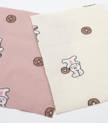 【25SS-202】ドーナッツラバーうさちゃんプリントフライス　/0.5ｙあたり = ～ 900円