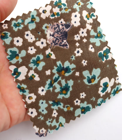 【25SS-230】小花にうもれるねこちゃんプリント綿ローン　/0.5ｙあたり = ～805円