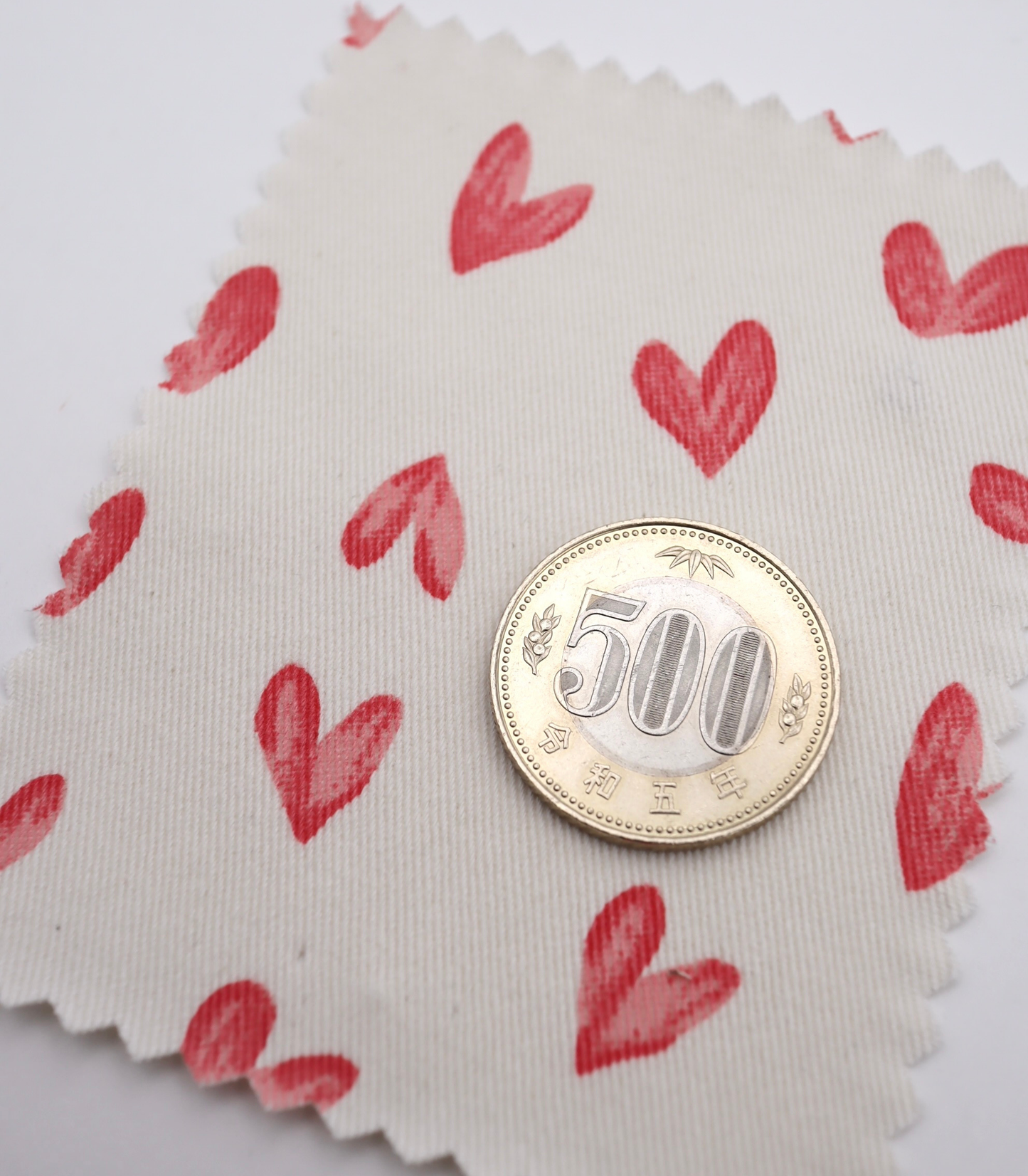 【25SS-057】スケッチ風ハートプリントツイル　/0.5ｙあたり = ～ 945円