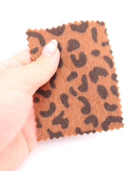 【25AW-039】フェイクハラコ毛足つるつるヒョウ柄プリント　/0.5ｙあたり=～1370円
