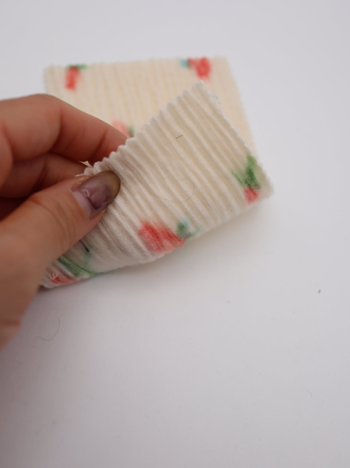 【25AW-160】小花柄プリーツ加工起毛天竺ニット　/0.5ｙあたり=～1125円