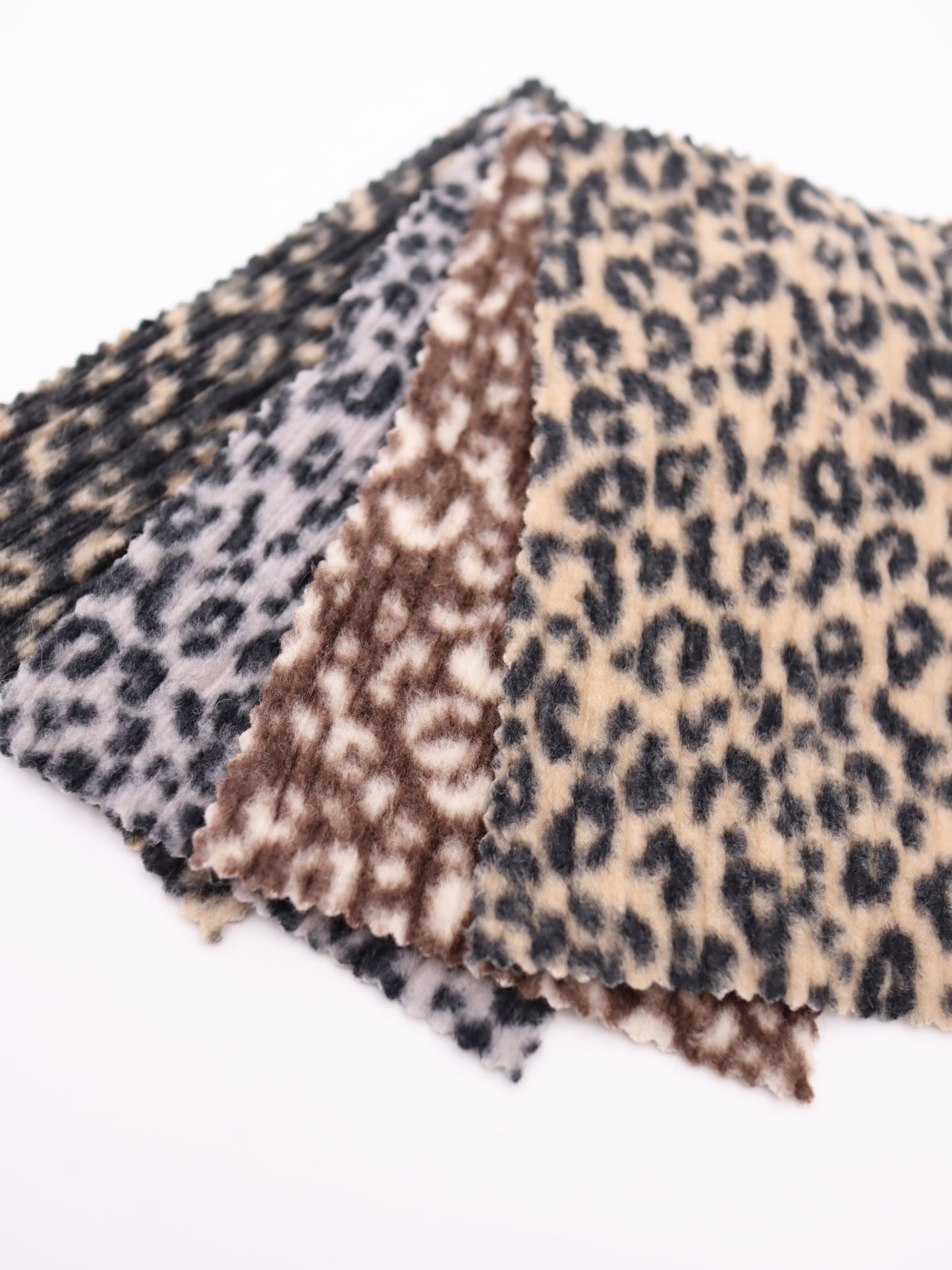 【25AW-167】プチヒョウ柄プリントランダムプリーツ加工起毛天竺ニット　/0.5ｙあたり=～1125円