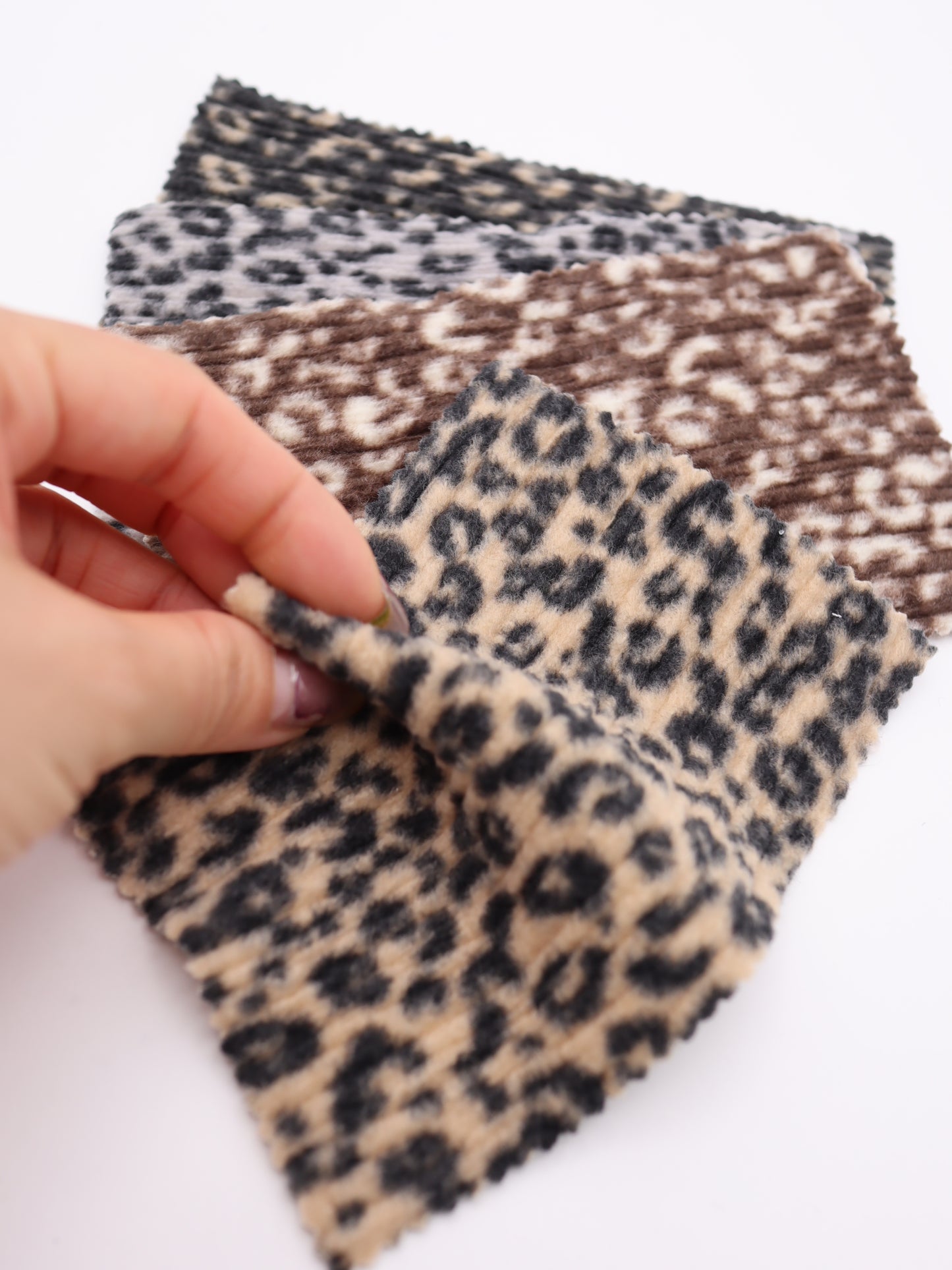 【25AW-167】プチヒョウ柄プリントランダムプリーツ加工起毛天竺ニット　/0.5ｙあたり=～1125円