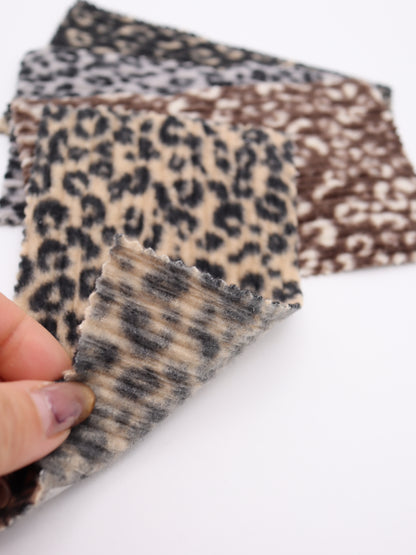 【25AW-167】プチヒョウ柄プリントランダムプリーツ加工起毛天竺ニット　/0.5ｙあたり=～1125円