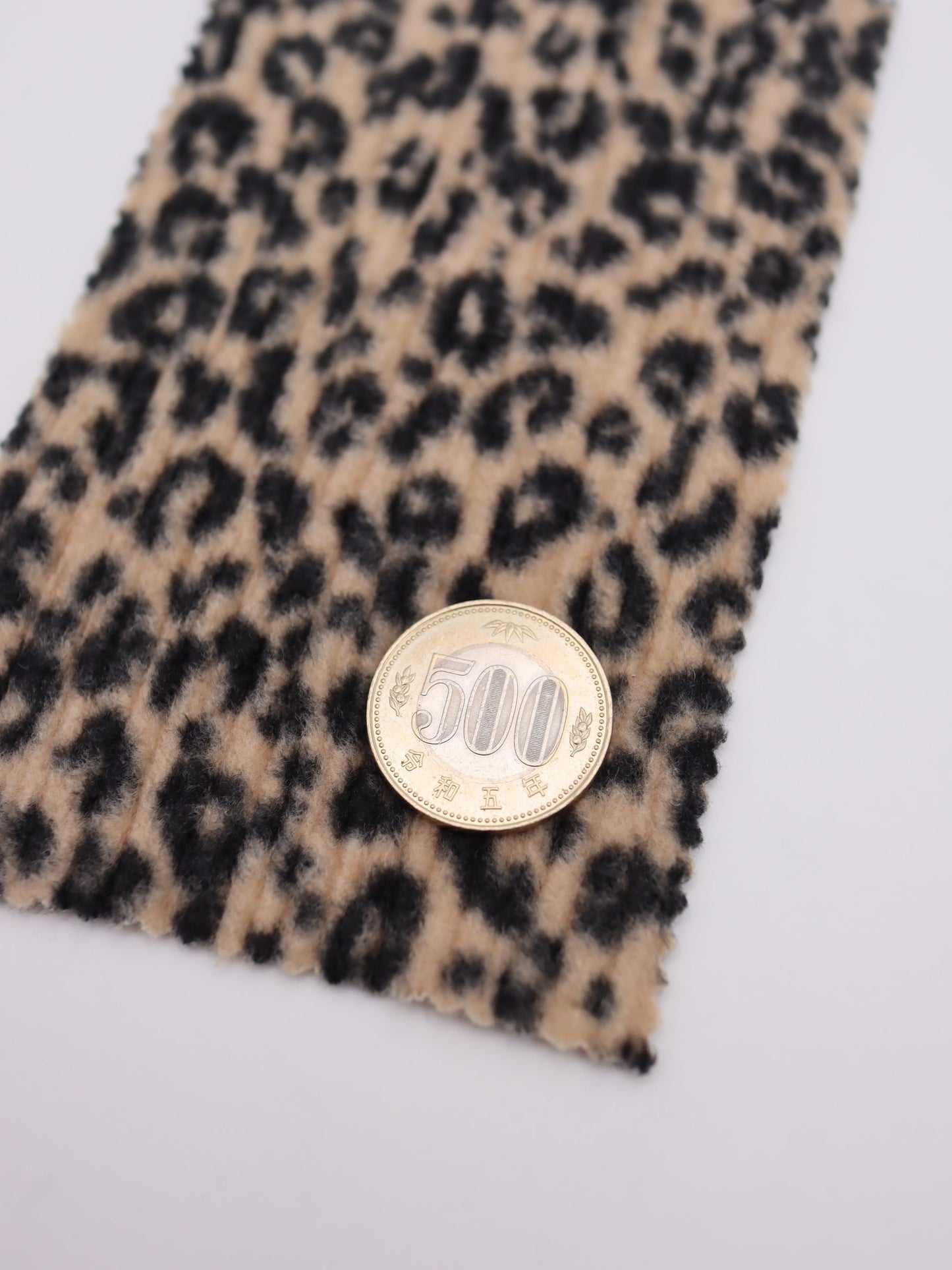 【25AW-167】プチヒョウ柄プリントランダムプリーツ加工起毛天竺ニット　/0.5ｙあたり=～1125円