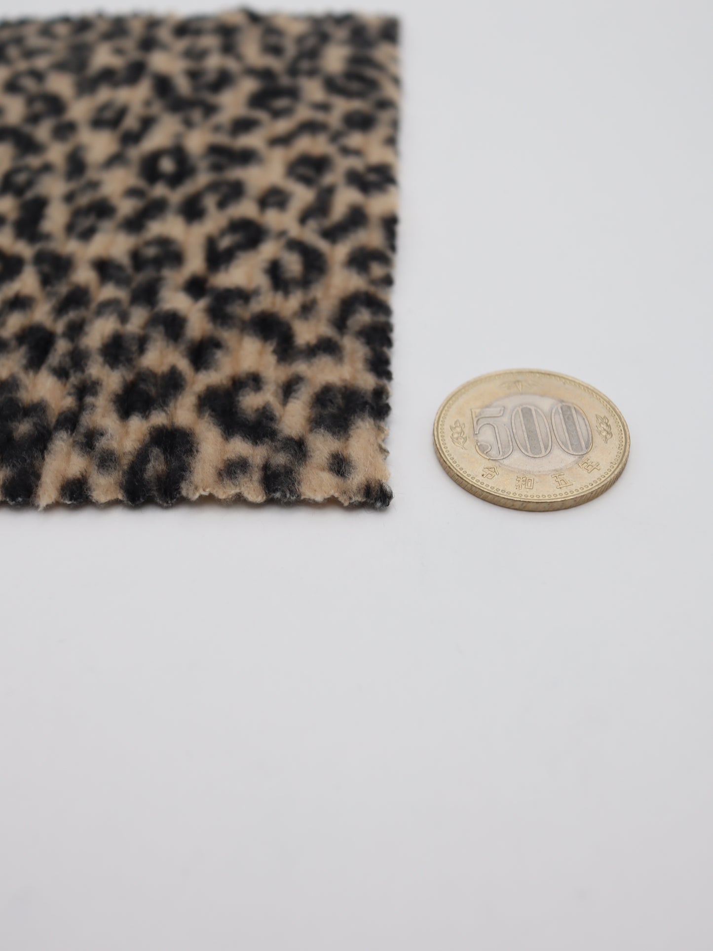 【25AW-167】プチヒョウ柄プリントランダムプリーツ加工起毛天竺ニット　/0.5ｙあたり=～1125円