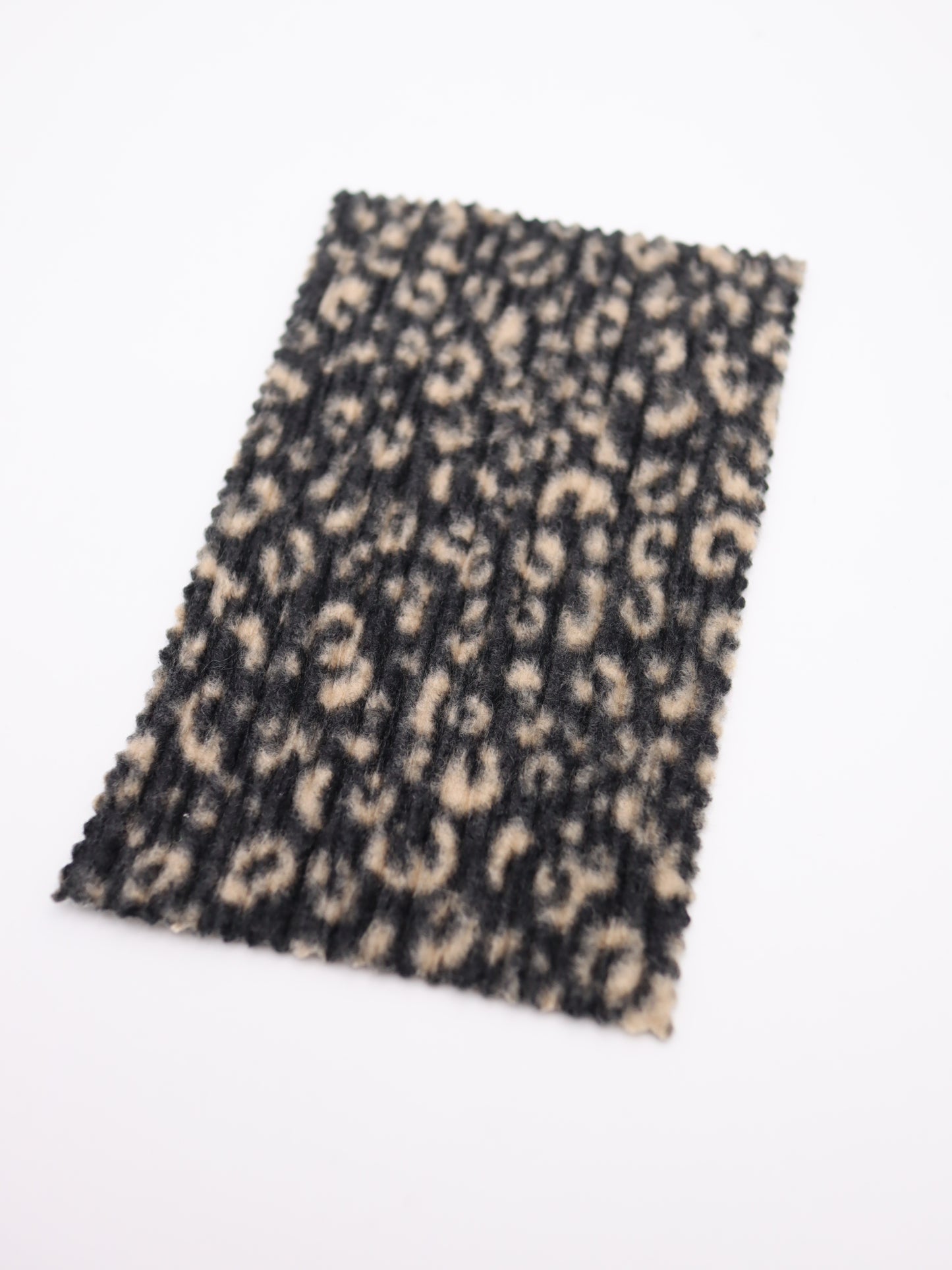 【25AW-167】プチヒョウ柄プリントランダムプリーツ加工起毛天竺ニット　/0.5ｙあたり=～1125円