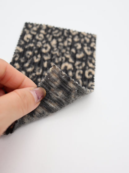 【25AW-167】プチヒョウ柄プリントランダムプリーツ加工起毛天竺ニット　/0.5ｙあたり=～1125円