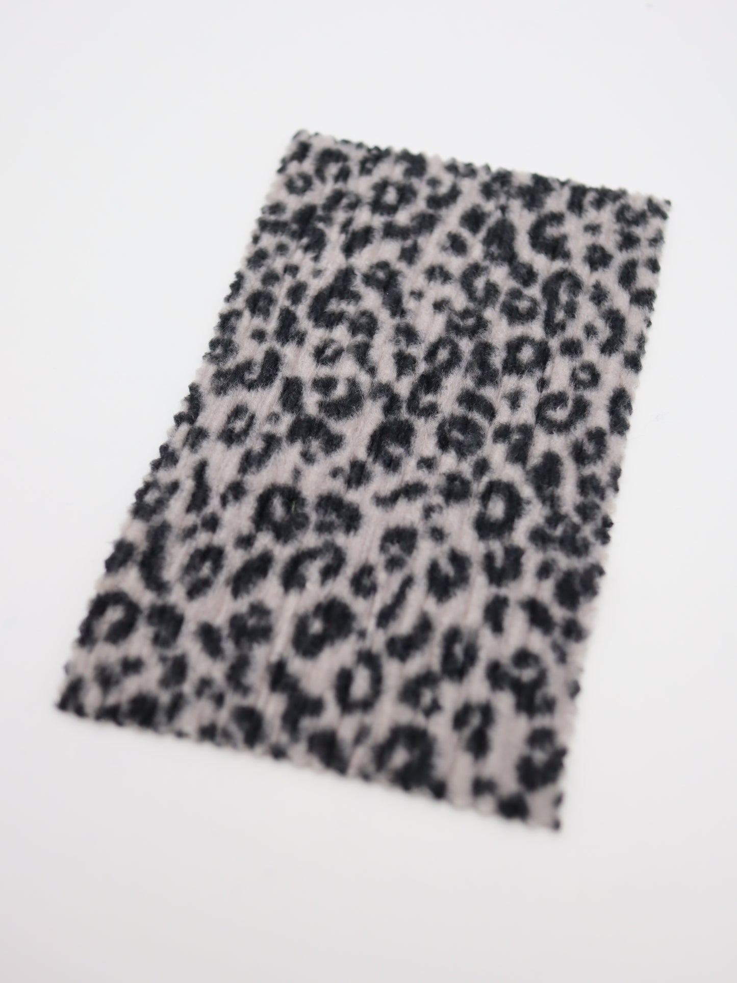 【25AW-167】プチヒョウ柄プリントランダムプリーツ加工起毛天竺ニット　/0.5ｙあたり=～1125円
