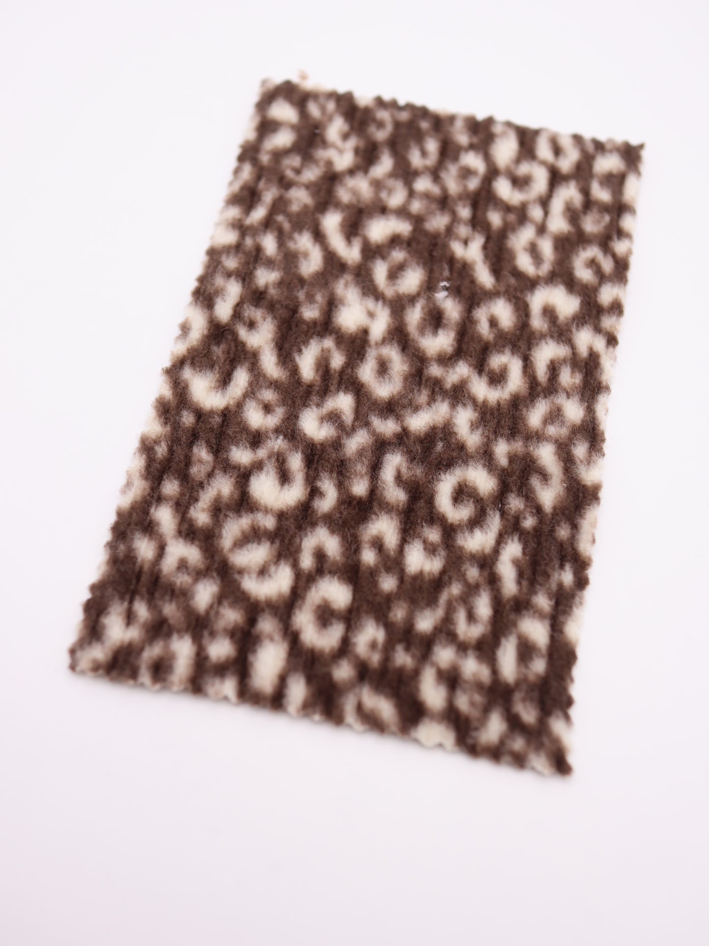 【25AW-167】プチヒョウ柄プリントランダムプリーツ加工起毛天竺ニット　/0.5ｙあたり=～1125円