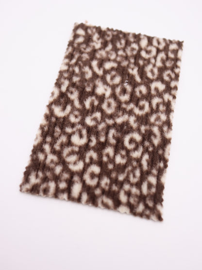 【25AW-167】プチヒョウ柄プリントランダムプリーツ加工起毛天竺ニット　/0.5ｙあたり=～1125円