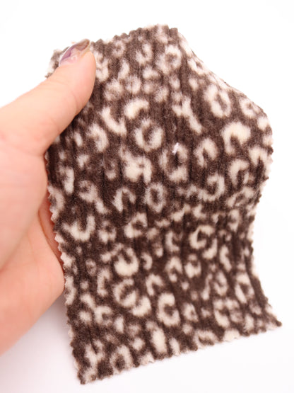 【25AW-167】プチヒョウ柄プリントランダムプリーツ加工起毛天竺ニット　/0.5ｙあたり=～1125円