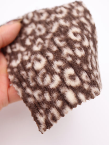 【25AW-167】プチヒョウ柄プリントランダムプリーツ加工起毛天竺ニット　/0.5ｙあたり=～1125円