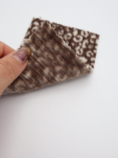 【25AW-167】プチヒョウ柄プリントランダムプリーツ加工起毛天竺ニット　/0.5ｙあたり=～1125円