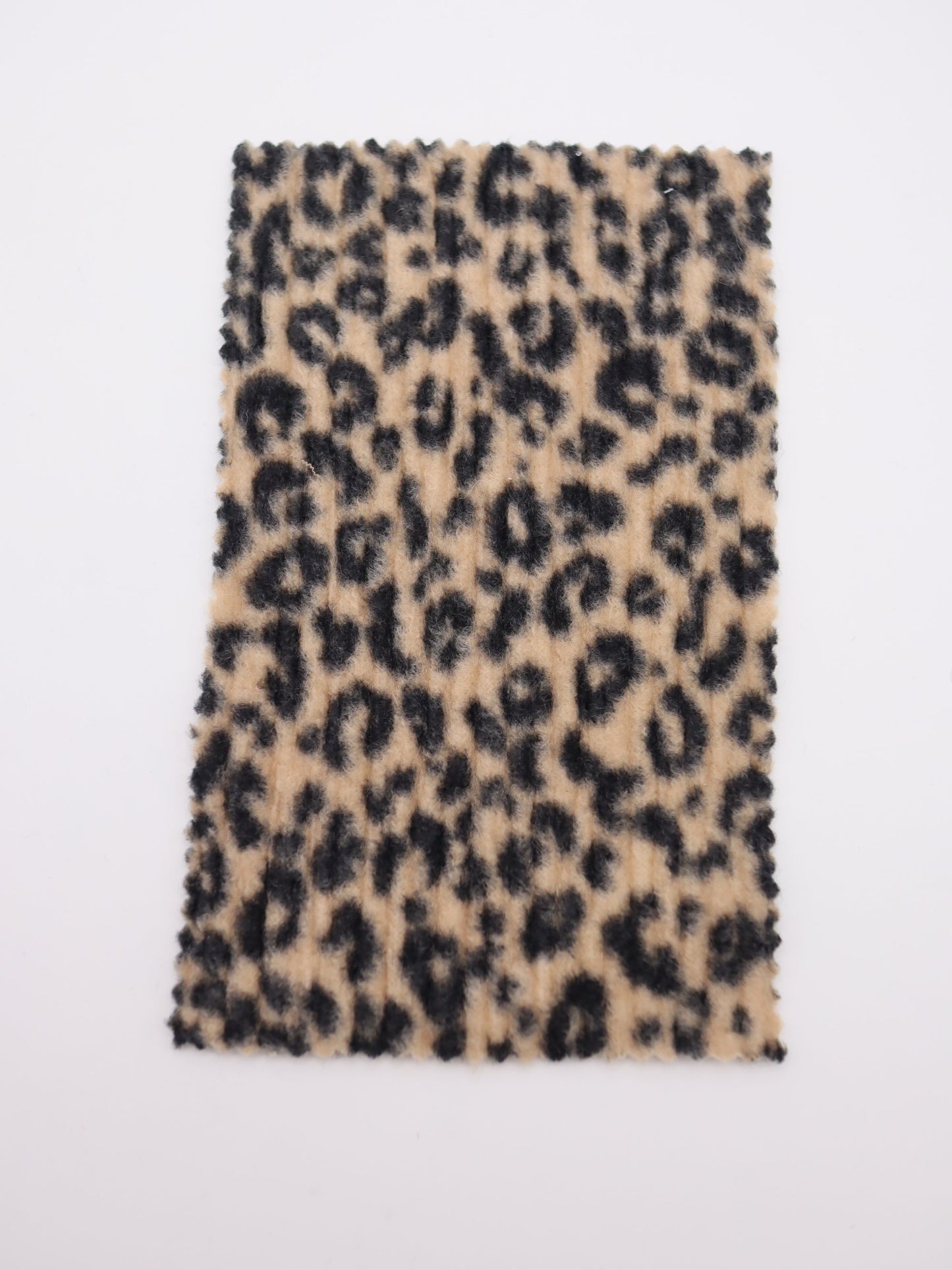 【25AW-167】プチヒョウ柄プリントランダムプリーツ加工起毛天竺ニット　/0.5ｙあたり=～1125円