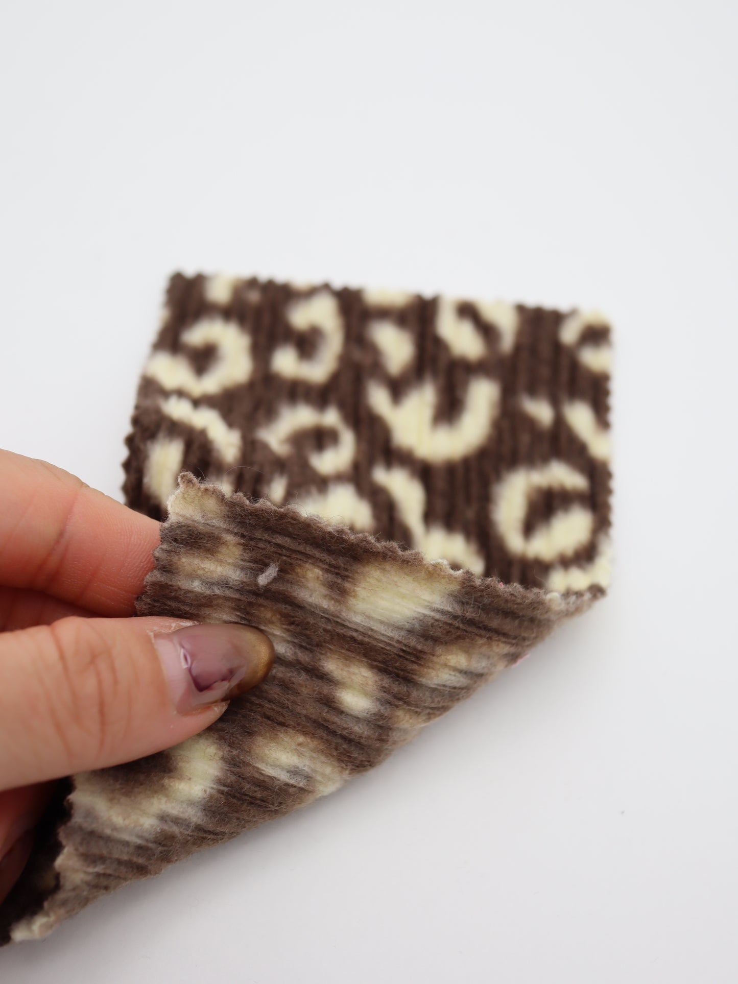 【25AW-162】ヒョウ柄プリントランダムプリーツ加工起毛天竺ニット　/0.5ｙあたり=～1125円