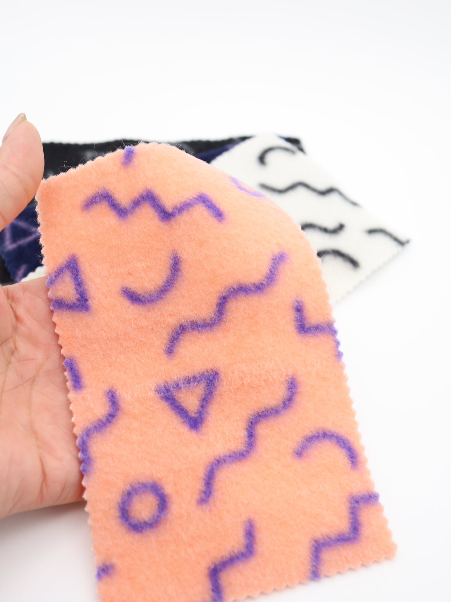 【25AW-031】幾何柄プリント両面起毛ニット　/0.5ｙあたり=～880円