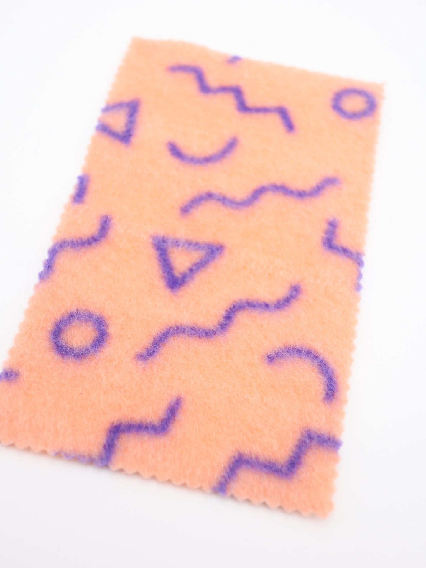 【25AW-031】幾何柄プリント両面起毛ニット　/0.5ｙあたり=～880円