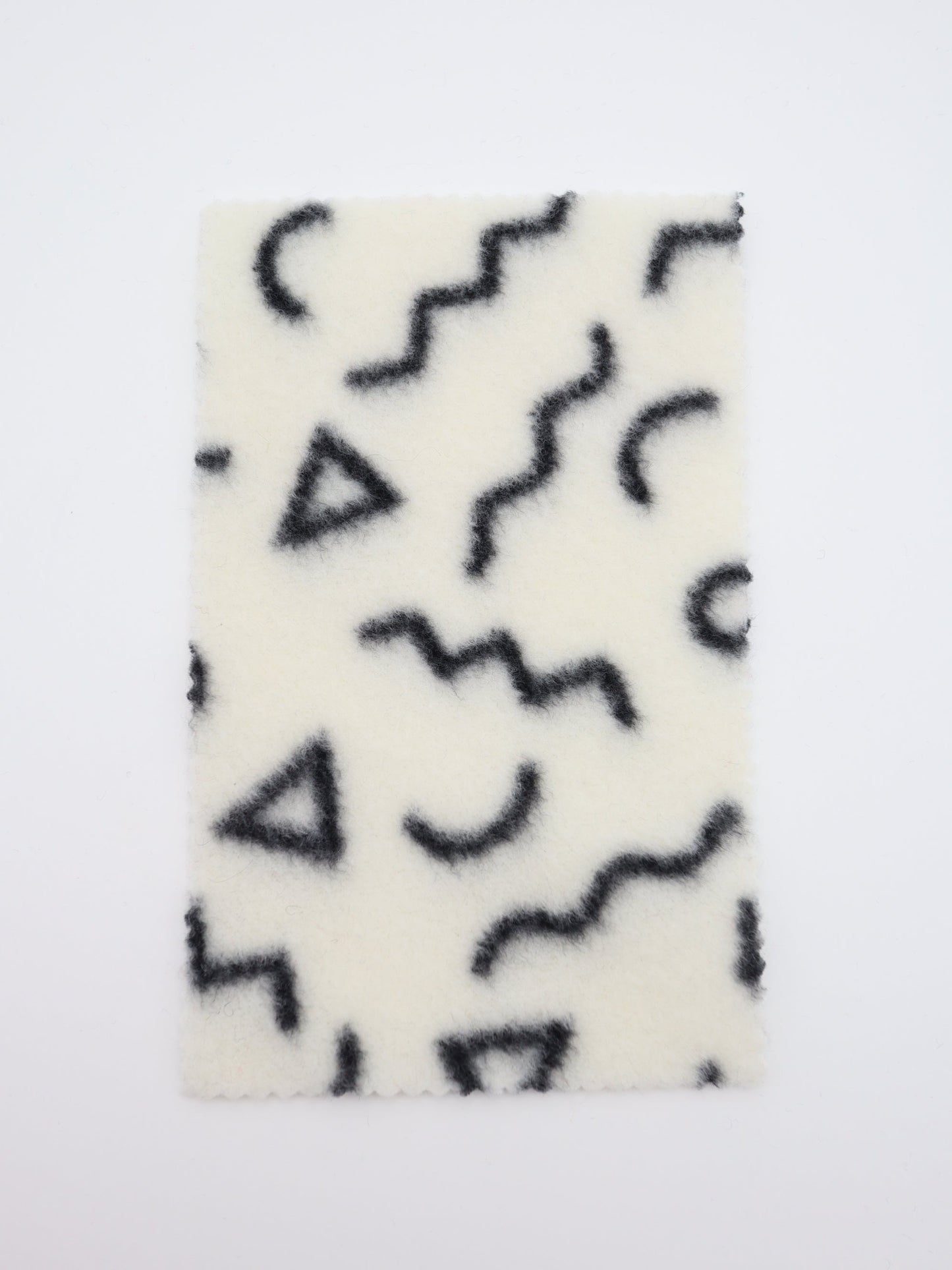 【25AW-031】幾何柄プリント両面起毛ニット　/0.5ｙあたり=～880円