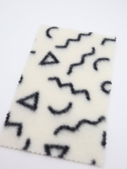 【25AW-031】幾何柄プリント両面起毛ニット　/0.5ｙあたり=～880円