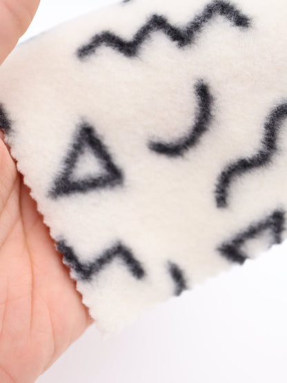 【25AW-031】幾何柄プリント両面起毛ニット　/0.5ｙあたり=～880円